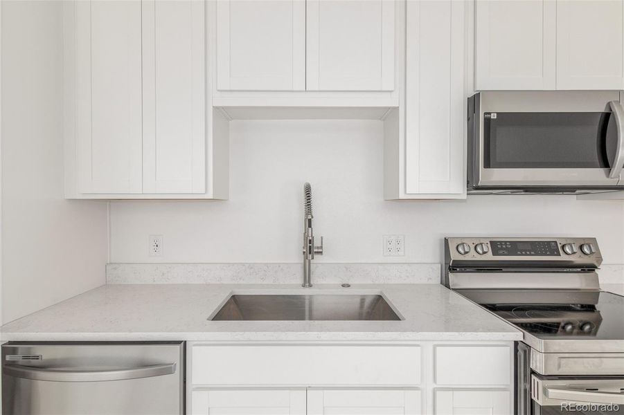 Furnished interior view inside a new home in , Denver (Image 2). Furnished interior view inside a new home in , Denver (Image 2).