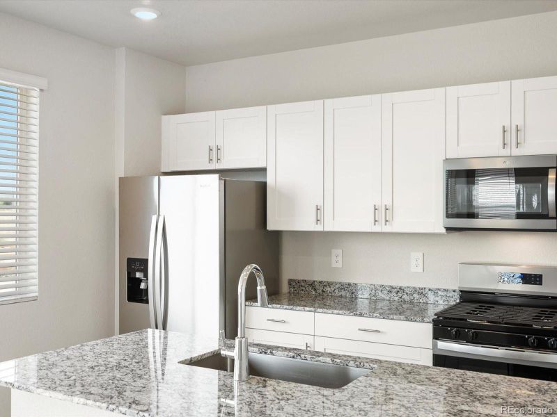 Furnished interior view inside a new home in Ridgeline Vista: The Flora Collection, Brighton (Image 9). Furnished interior view inside a new home in Ridgeline Vista: The Flora Collection, Brighton (Image 9).