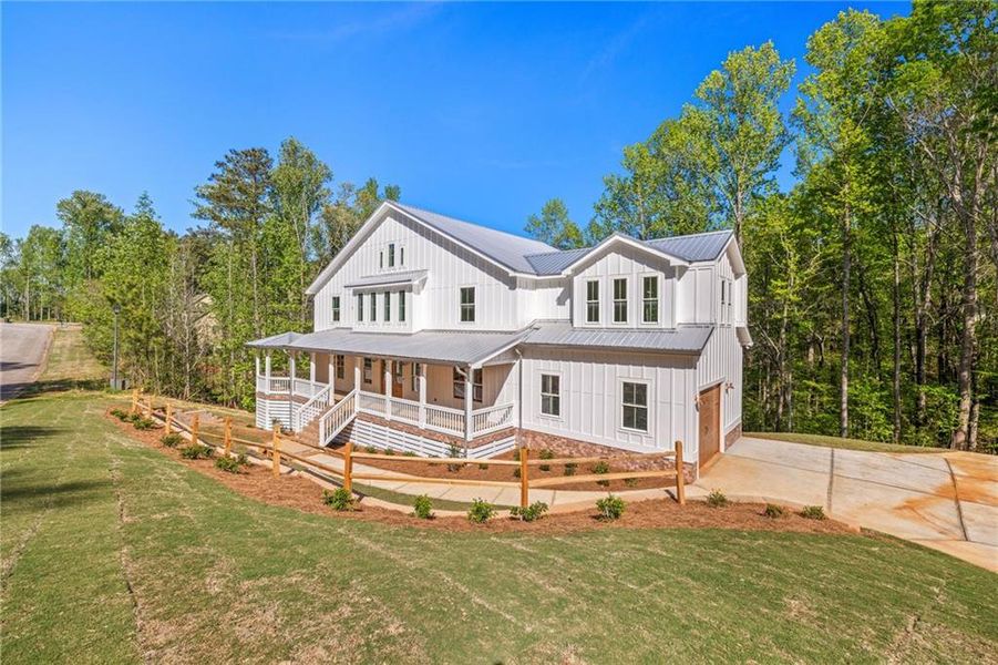 Front exterior of a new home in , Flowery Branch, GA, highlighting curb appeal (Image 25).