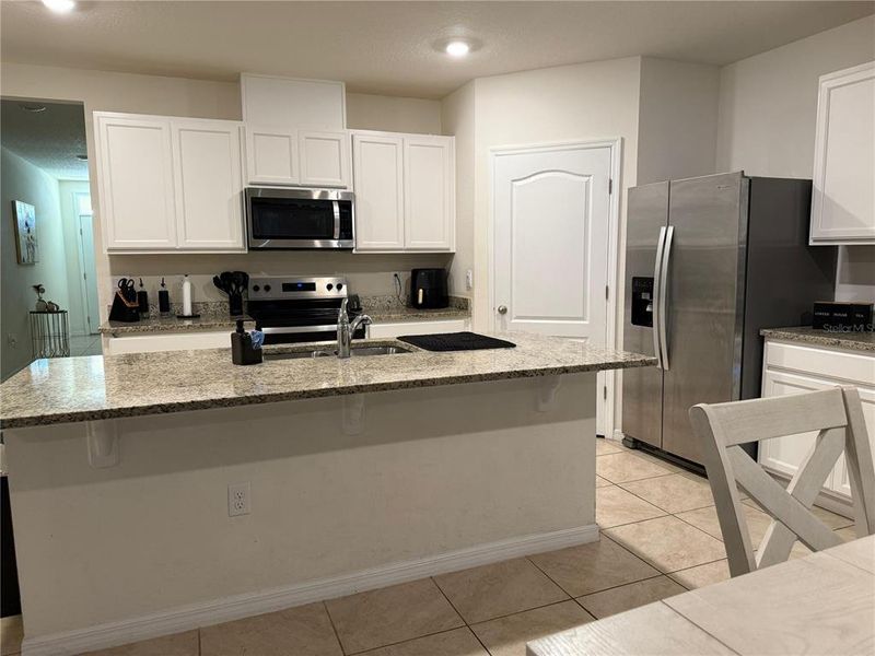 Furnished interior view inside a new home in Cypress Park Estates, Haines City (Image 7).