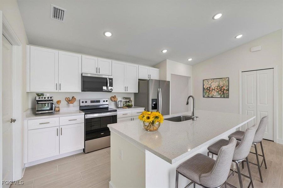 Furnished interior view inside a new home in Cape Coral, Cape Coral (Image 4). Furnished interior view inside a new home in Cape Coral, Cape Coral (Image 4).