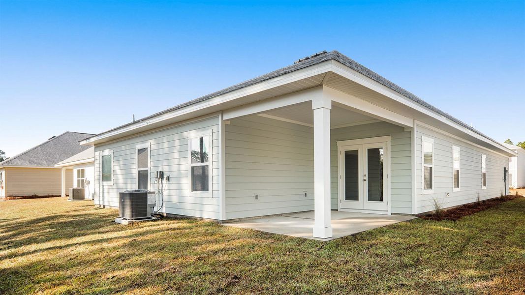 Exterior details and patio area of a home in Bayside at Ward Creek, Panama City Beach (Image 3).