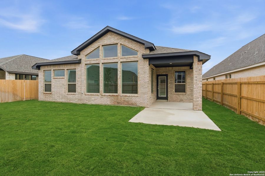 Exterior details and patio area of a home in Alsatian Oaks, Castroville (Image 3).