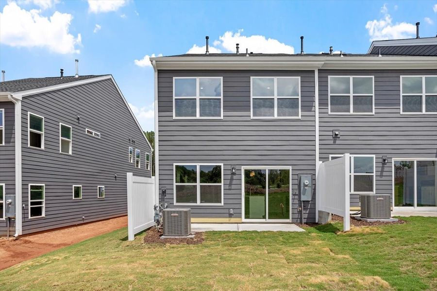 Exterior details and patio area of a home in Sweetbrier, Durham (Image 4).