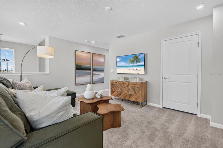Furnished interior view inside a new home in Pasadena Ridge Master, Dade City (Image 17).