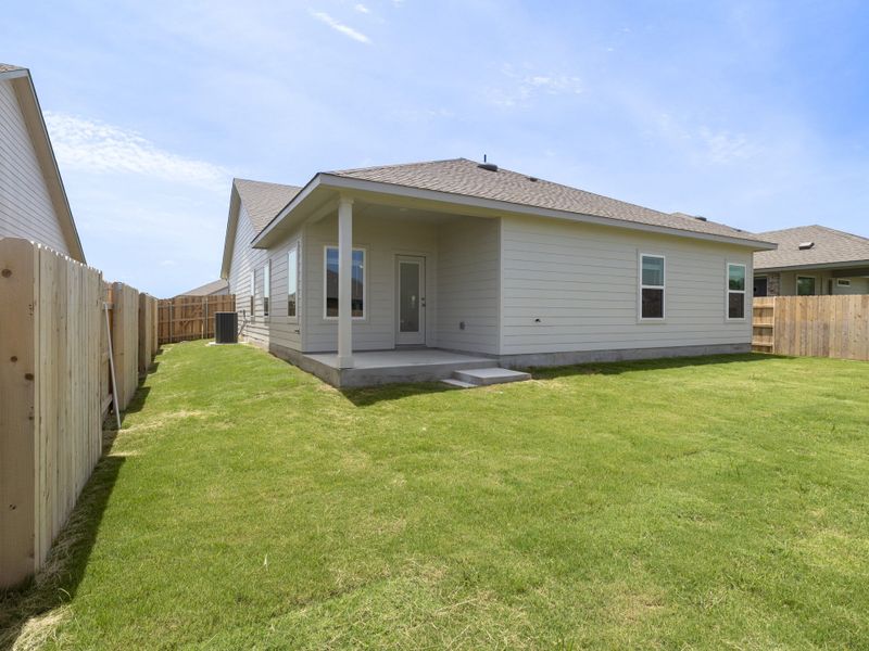 Exterior details and patio area of a home in Grande Estates, Bertram (Image 4).