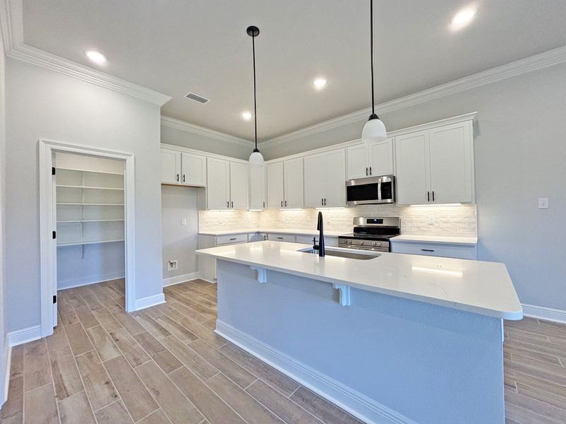 Furnished interior view inside a new home in Natureview, Freeport (Image 10).