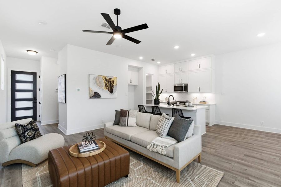 Representative furnished interior of a home built from the Balder by Chesmar Homes in Centero at Stone Oak, San Antonio (Image 5).