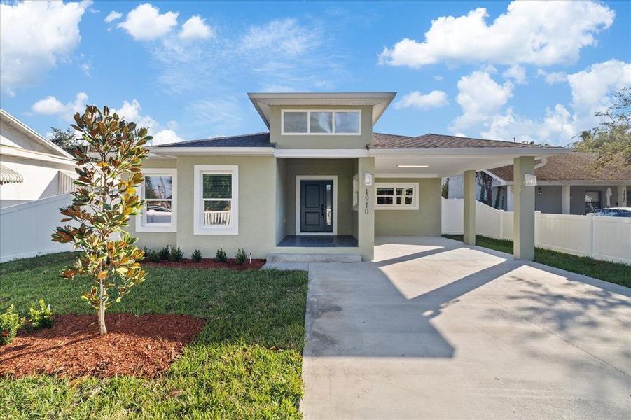 Front exterior of a new home in , St. Petersburg, FL, highlighting curb appeal (Image 27). Front exterior of a new home in , St. Petersburg, FL, highlighting curb appeal (Image 27).