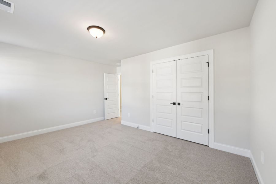 Spacious, unfurnished interior of a new home in Vines at Mill Creek - Legacy Series, Braselton (Image 29). Spacious, unfurnished interior of a new home in Vines at Mill Creek - Legacy Series, Braselton (Image 29).