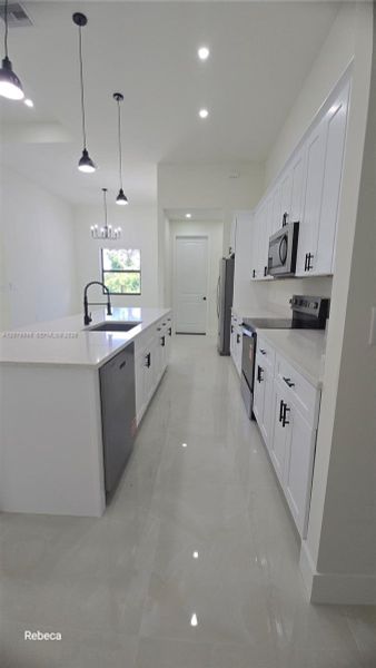 Furnished interior view inside a new home in , Lehigh Acres (Image 6).
