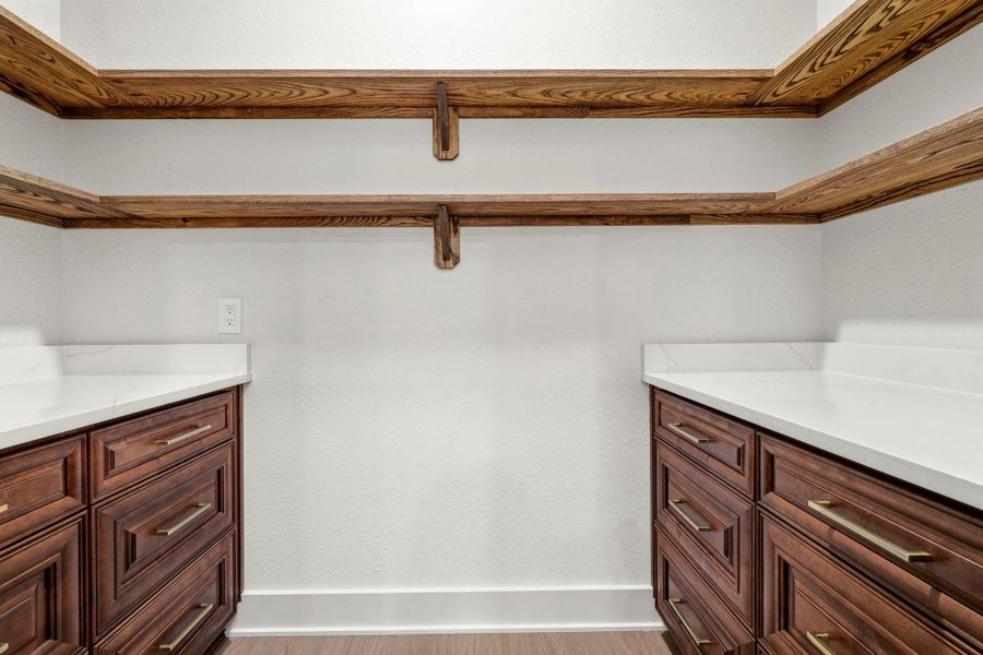 Walk-in pantry off the kitchen Walk-in pantry off the kitchen