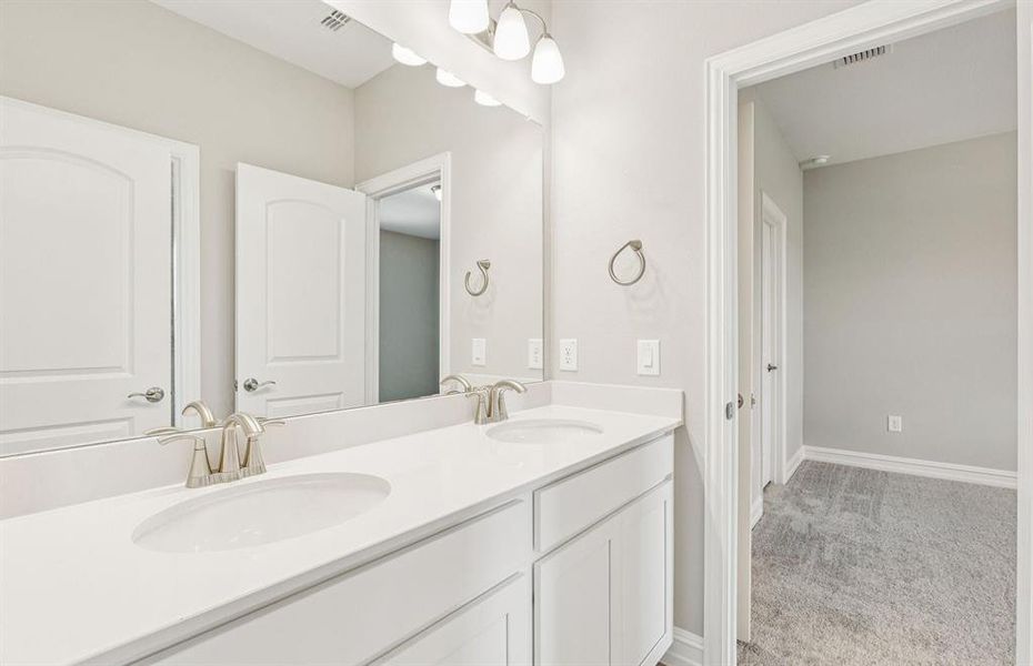 Spacious secondary bathroom with double sinks
