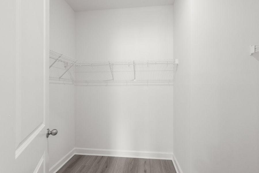 Spacious, unfurnished interior of a new home in Cypress Ridge - The Boardwalk Series, Longs (Image 20).