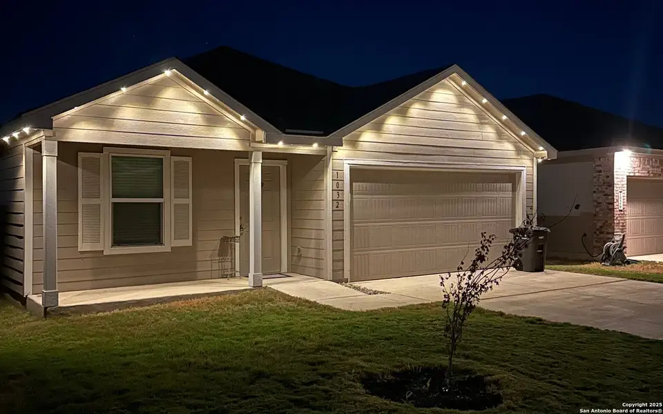 Front exterior of a new home in Mission del Lago: Watermill Collection, San Antonio, TX, highlighting curb appeal (Image 1). Front exterior of a new home in Mission del Lago: Watermill Collection, San Antonio, TX, highlighting curb appeal (Image 1).