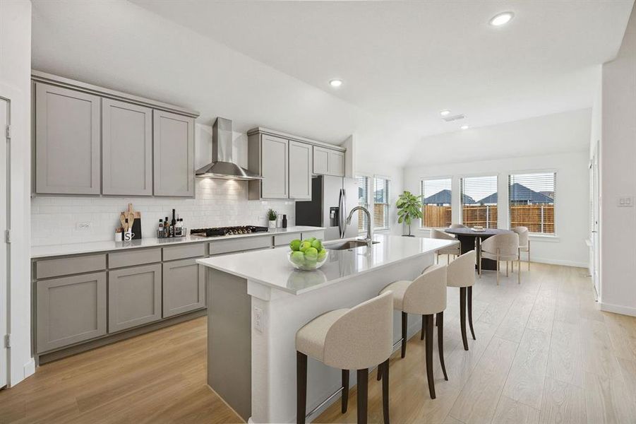 Kitchen in the Gilmour II home plan by Trophy Signature Homes – REPRESENTATIVE PHOTO