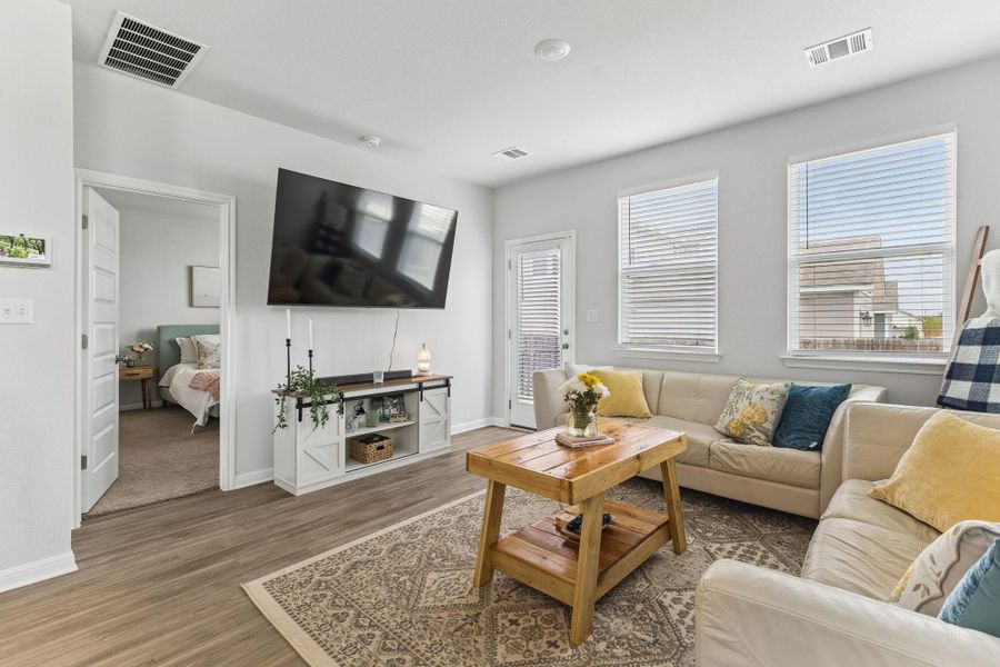 Furnished interior view inside a new home in Stallion Run, Buda (Image 11).