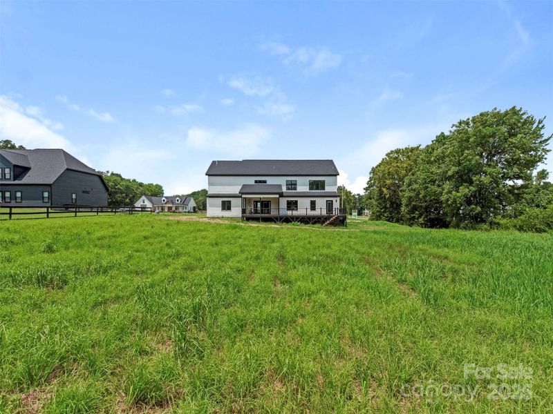 Front exterior of a new home in , Waxhaw, NC, highlighting curb appeal (Image 24).