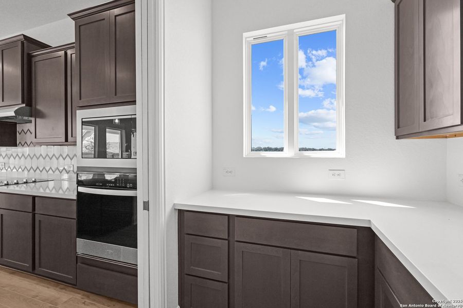 Furnished interior view inside a new home in Megan's Landing, Castroville (Image 7).