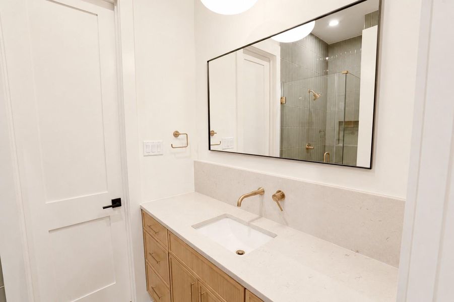 Bathroom vanity with quartz countertop for first floor bedroom or optional study Bathroom vanity with quartz countertop for first floor bedroom or optional study