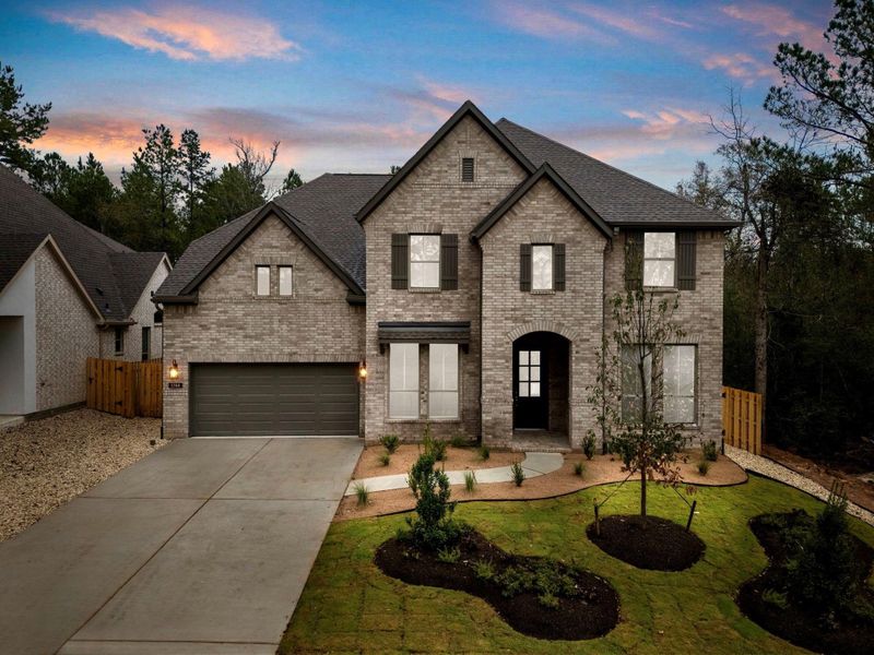 Front exterior of a new home in Colton, Montgomery, TX, highlighting curb appeal (Image 21).