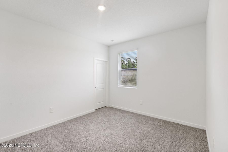 Spacious, unfurnished interior of a new home in Flagler Village - Signature Series, Palm Coast (Image 22). Spacious, unfurnished interior of a new home in Flagler Village - Signature Series, Palm Coast (Image 22).