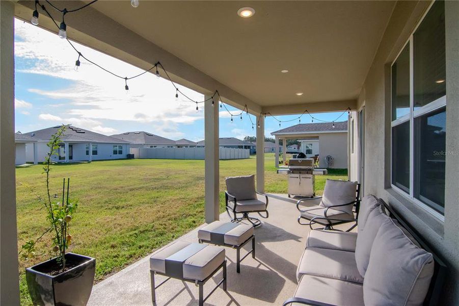 Exterior details and patio area of a home in Riverstone, Land O' Lakes (Image 3). Exterior details and patio area of a home in Riverstone, Land O' Lakes (Image 3).