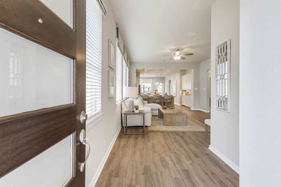 Representative furnished interior of a home built from the Adele by Chesmar Homes in Legacy at Lake Dunlap, New Braunfels (Image 2). Representative furnished interior of a home built from the Adele by Chesmar Homes in Legacy at Lake Dunlap, New Braunfels (Image 2).