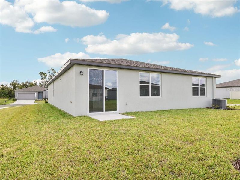 Exterior details and patio area of a home in The Reserve at Van Oaks, Auburndale (Image 4). Exterior details and patio area of a home in The Reserve at Van Oaks, Auburndale (Image 4).