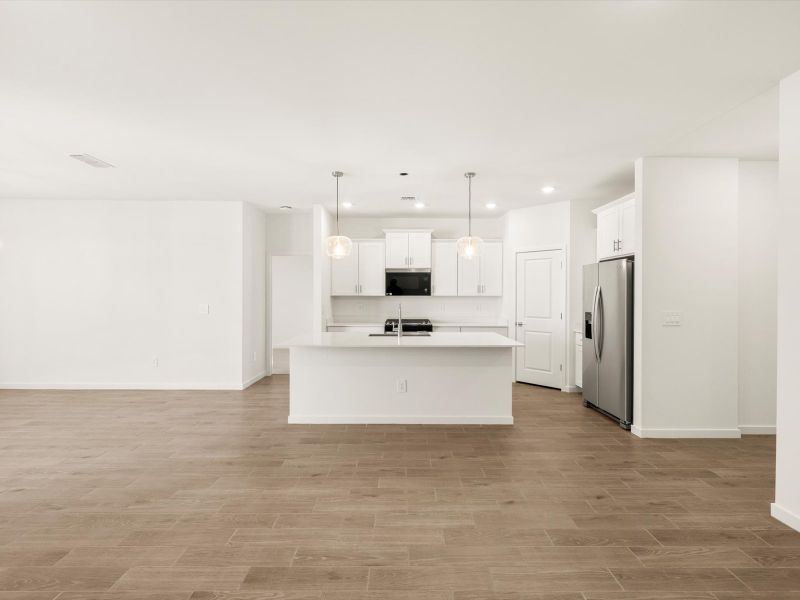 Spacious, unfurnished interior of a new home in Bella Vista Farms Estate Series, San Tan Valley (Image 5).