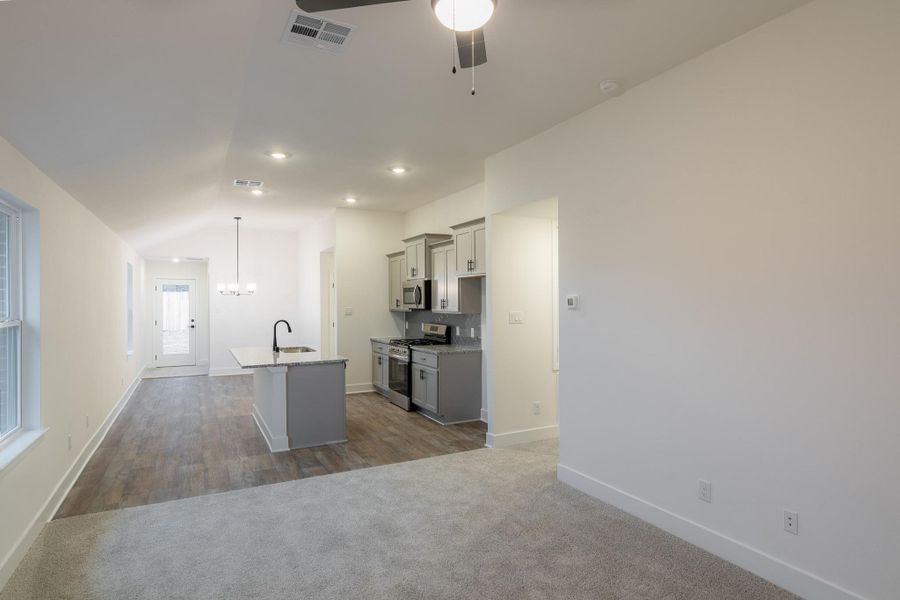 Furnished interior view inside a new home in , Conroe (Image 6).