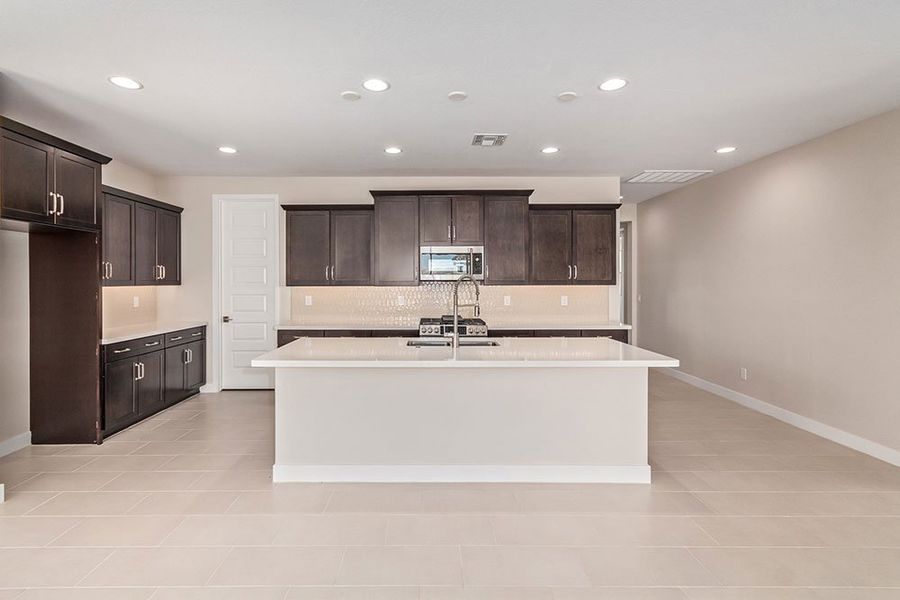 Representative furnished interior of a home built from the Zafiro by Taylor Morrison in CantaMia at Estrella 55+, Goodyear (Image 4).