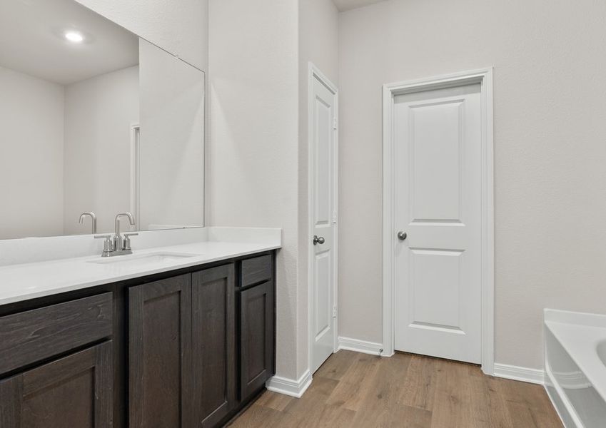 The master bathroom has a large vanity space. The master bathroom has a large vanity space.