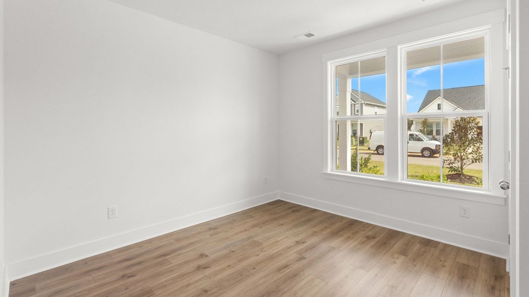 Spacious secondary bedroom with natural light and views of Chestnut Farms. Spacious secondary bedroom with natural light and views of Chestnut Farms.