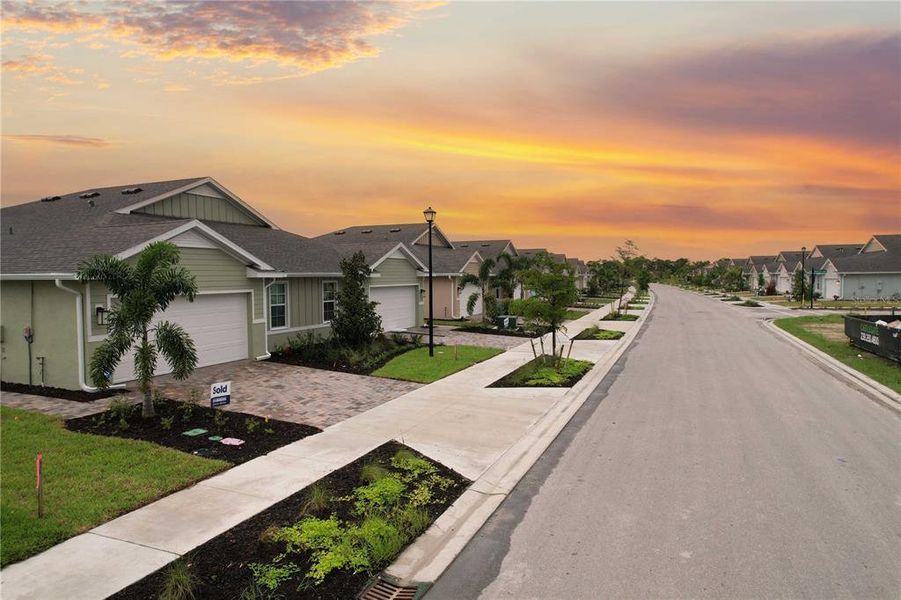 Front exterior of a new home in , Punta Gorda, FL, highlighting curb appeal (Image 24).