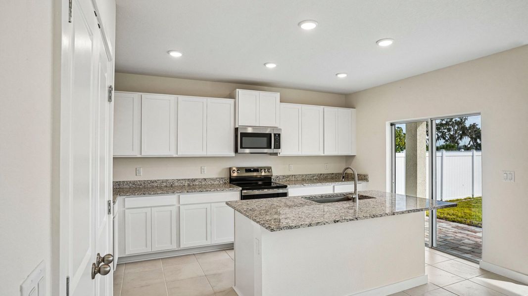 Furnished interior view inside a new home in Willowbrook North, Winter Haven (Image 13).