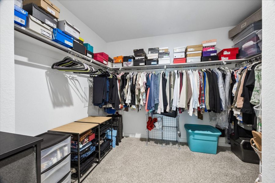 Large primary walk-in closet. Great space! Large primary walk-in closet. Great space!