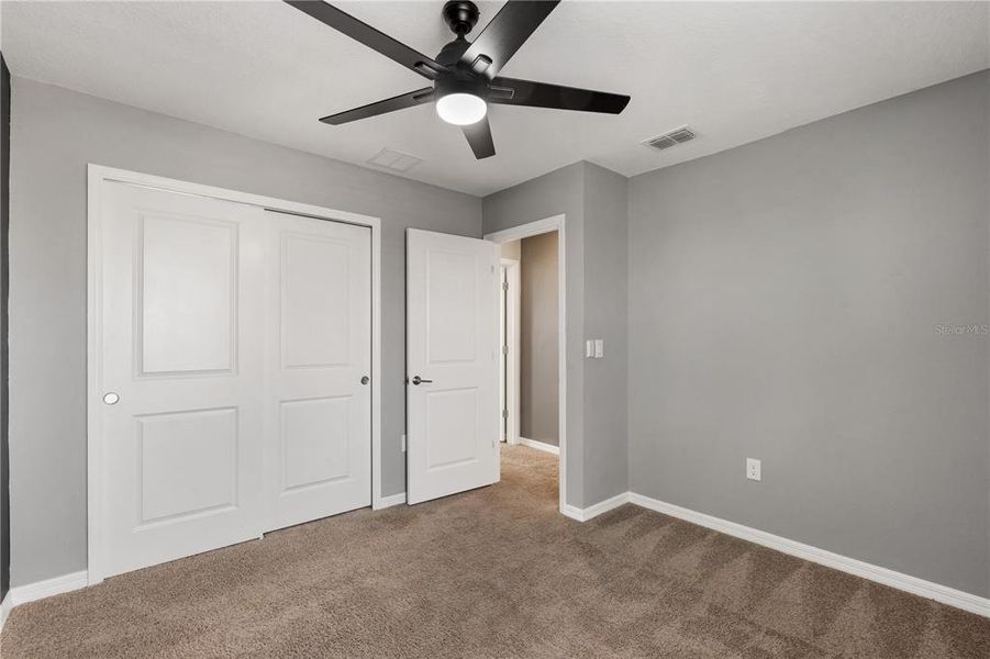 Spacious, unfurnished interior of a new home in Parkside at Cherry Lake, Groveland (Image 15).