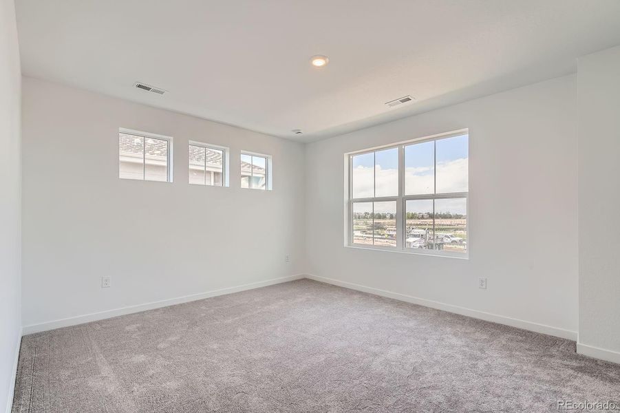 Spacious, unfurnished interior of a new home in Eastcreek Farm: Paired Homes, Thornton (Image 9).