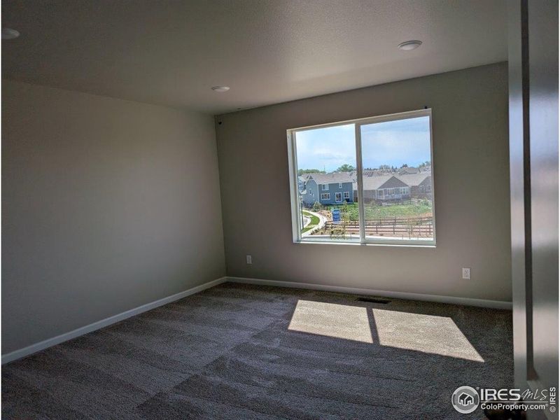 Spacious, unfurnished interior of a new home in Highlands Preserve, Mead (Image 13).