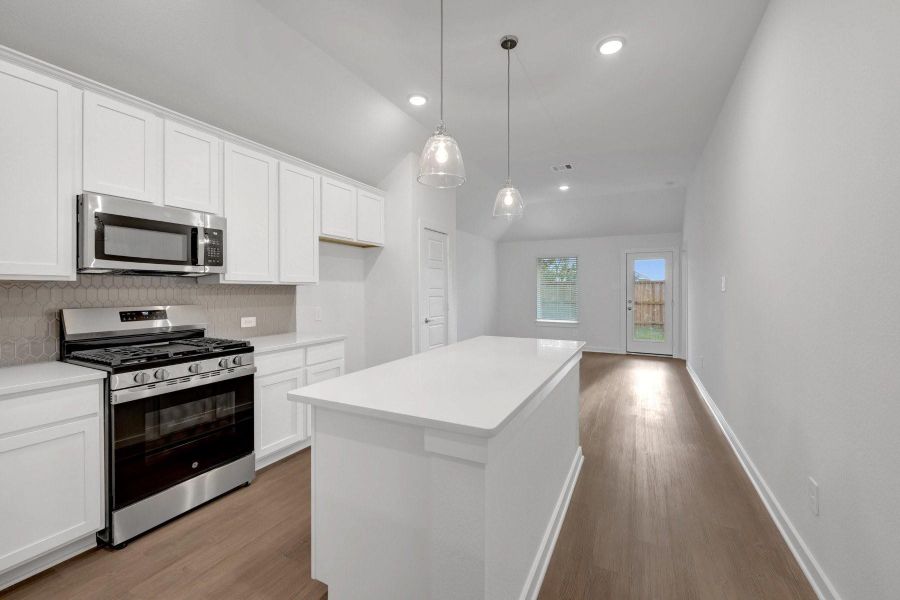 Furnished interior view inside a new home in Lone Star Landing, Montgomery (Image 6).