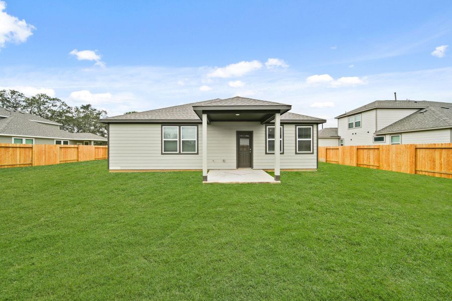 Exterior details and patio area of a home in Valor Park, Bay City (Image 18).