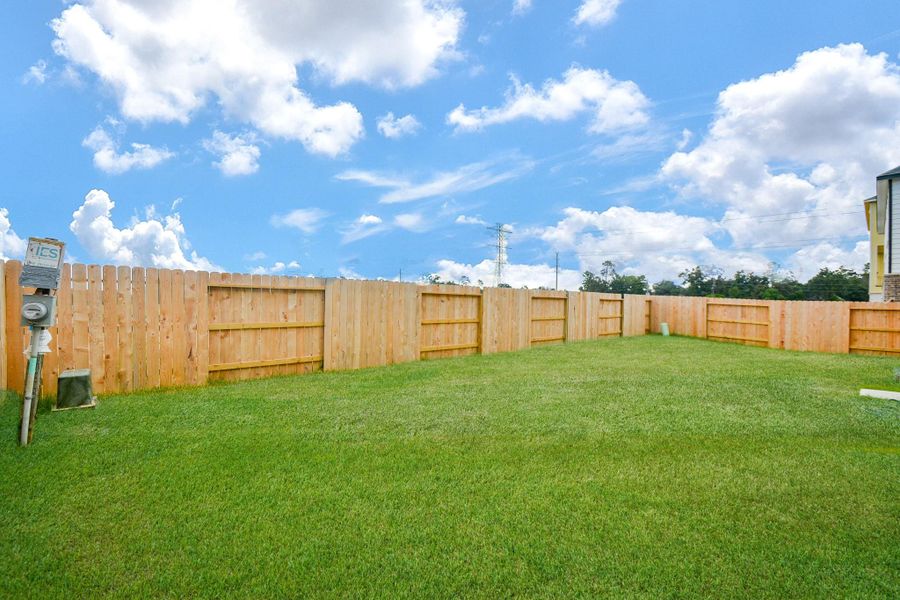This backyard is fully fenced that ensures your privacy.
