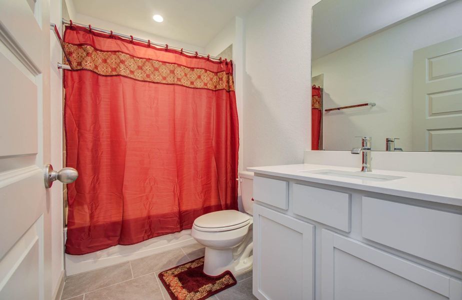 Furnished interior view inside a new home in Parks Edge, Missouri City (Image 27).