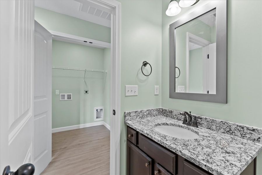 Representative furnished interior of a home built from the Rozlynn by Enchanted Homes in Guadalupe Heights, Seguin (Image 15).