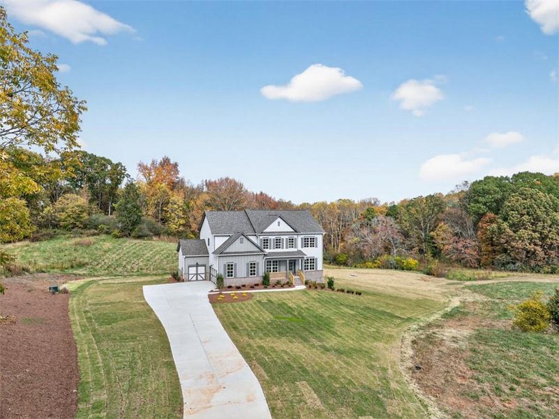 Front exterior of a new home in , Gainesville, GA, highlighting curb appeal (Image 31).
