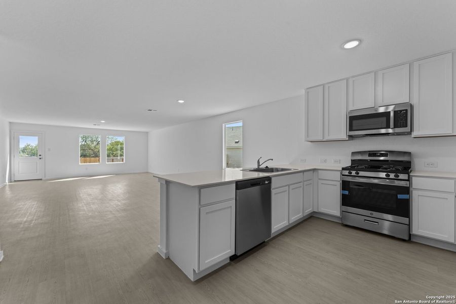 Furnished interior view inside a new home in Lodi Grove, Floresville (Image 4).