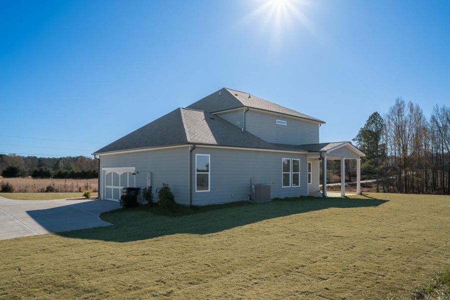 Exterior details and patio area of a home in Magnolia Ridge, Monroe (Image 23).