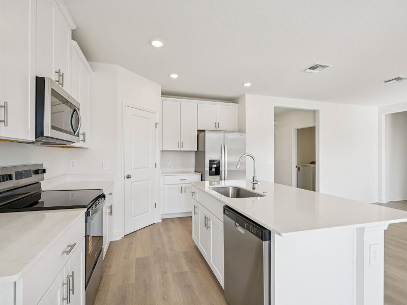 Furnished interior view inside a new home in The Reserve at Hammock Oaks - Signature Series, Lady Lake (Image 5).