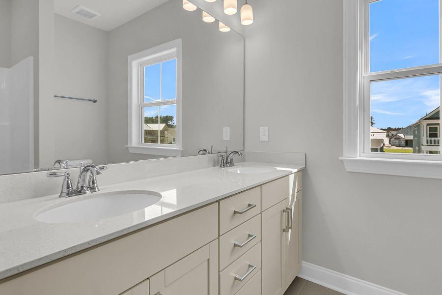 Furnished interior view inside a new home in Tidewater at Lakes of Cane Bay, Summerville (Image 8).